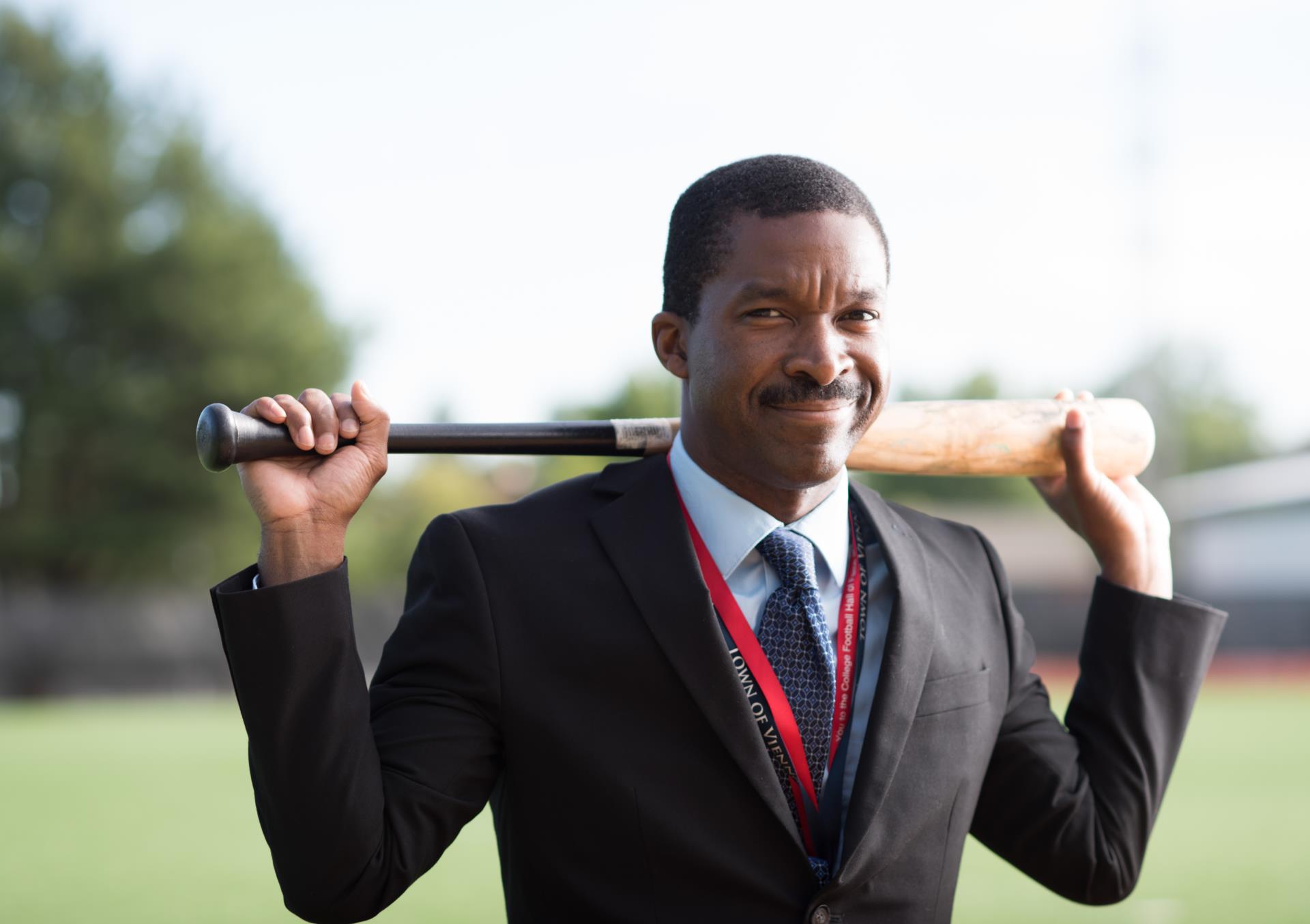 Town Manager with bat