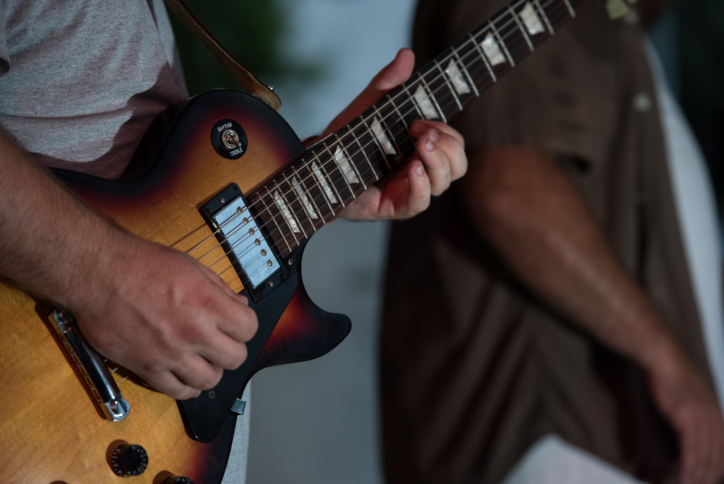 person playing guitar