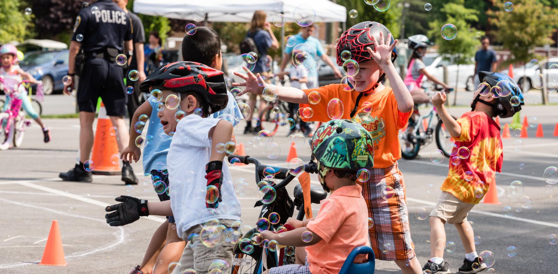 Kids playing with bubbles